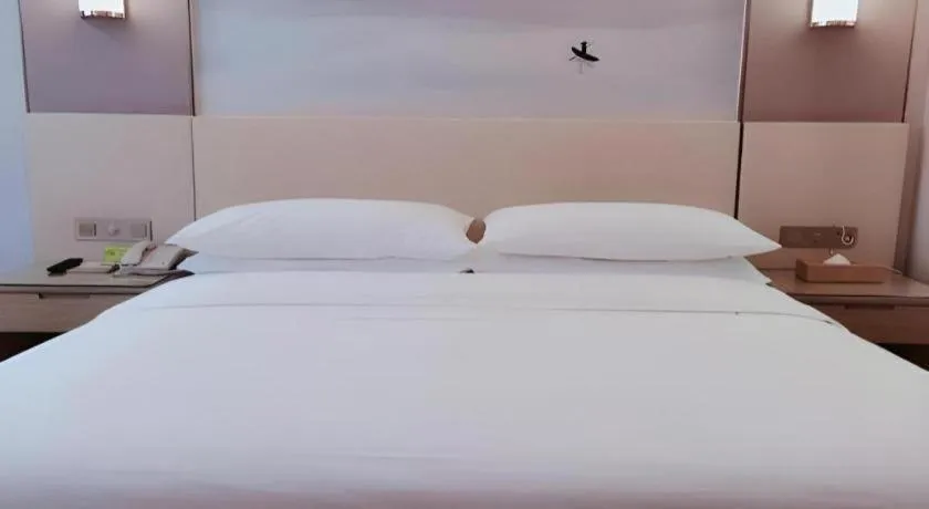 Bed in Vienna Hotel Hunan Huaihua Xupu Wanda Plaza