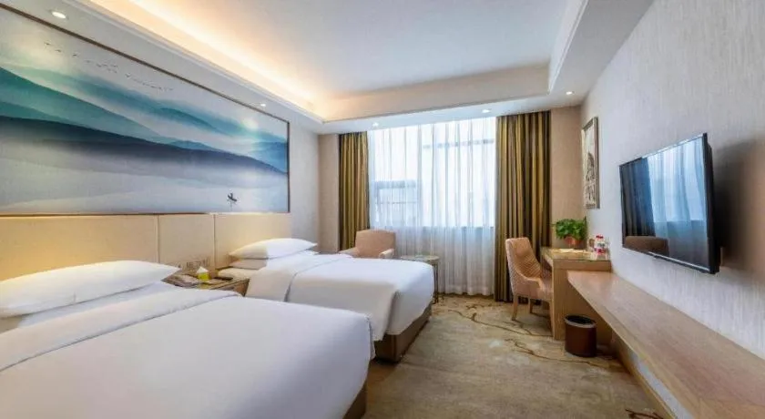 Bed in Vienna Hotel Hunan Huaihua Xupu Wanda Plaza