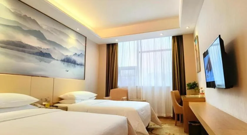 Bed in Vienna Hotel Hunan Huaihua Xupu Wanda Plaza