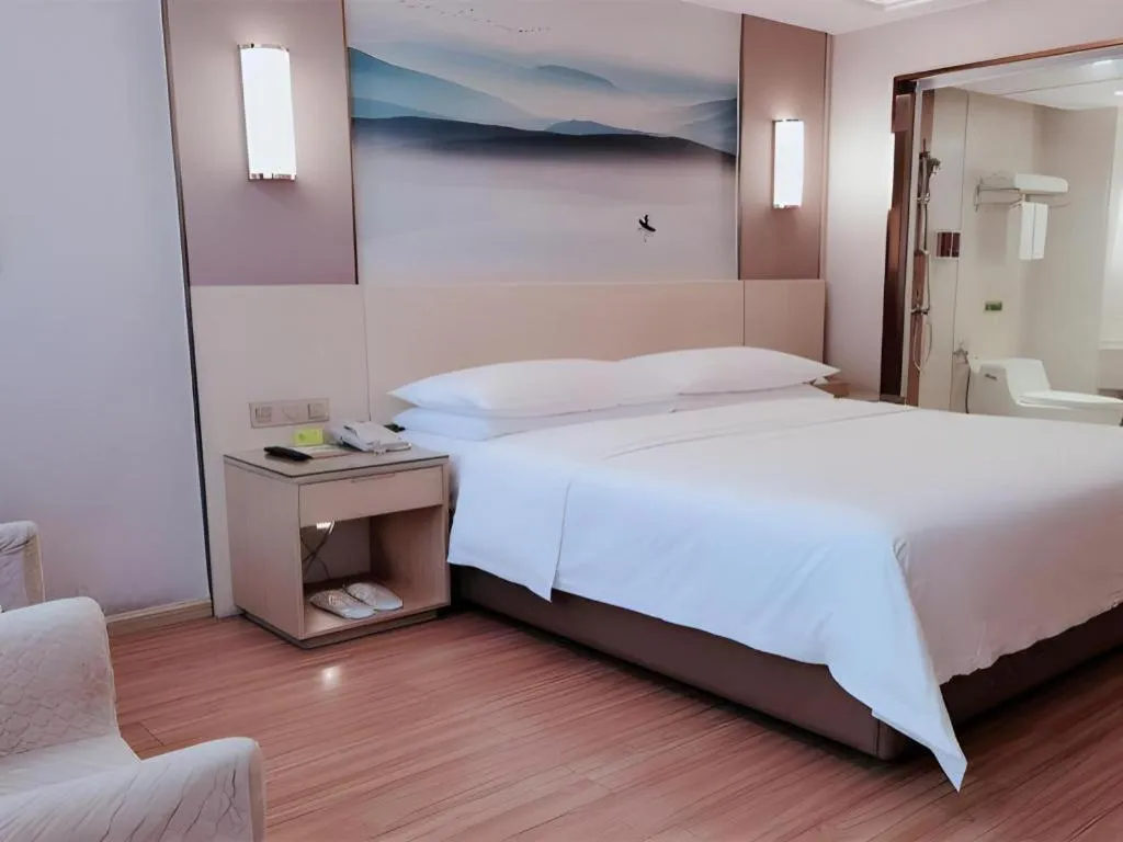 Bed in Vienna Hotel Hunan Huaihua Xupu Wanda Plaza