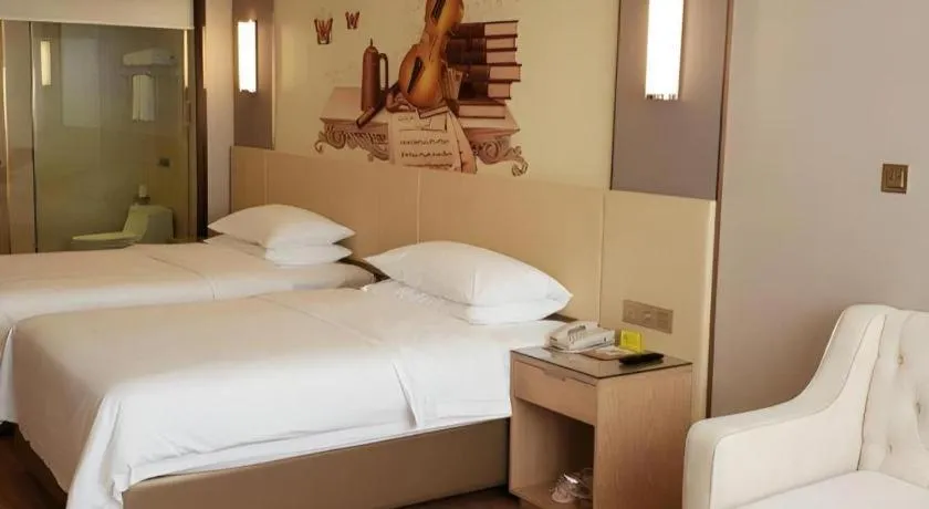 Bed in Vienna Hotel Hunan Huaihua Xupu Wanda Plaza
