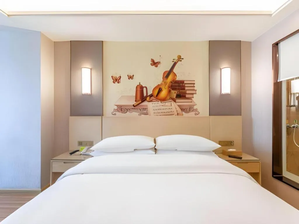 Bed in Vienna Hotel Hunan Huaihua Xupu Wanda Plaza