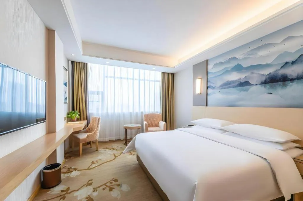 Bed in Vienna Hotel Hunan Huaihua Xupu Wanda Plaza