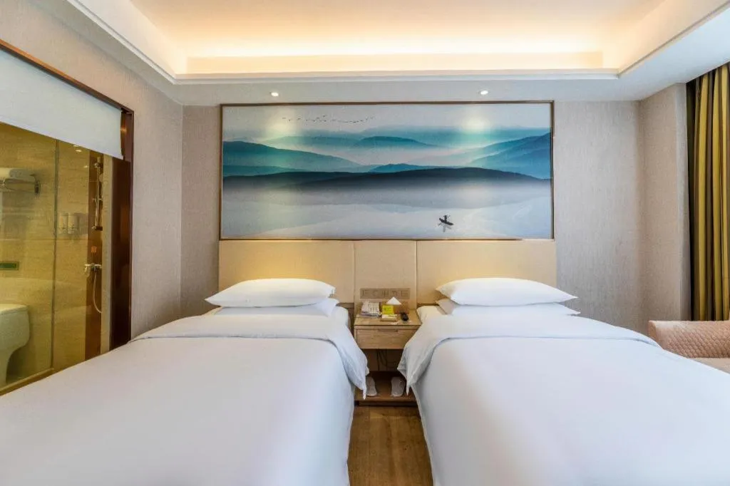 Bed in Vienna Hotel Hunan Huaihua Xupu Wanda Plaza