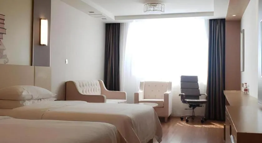 Bed in Vienna Hotel Hunan Huaihua Xupu Wanda Plaza