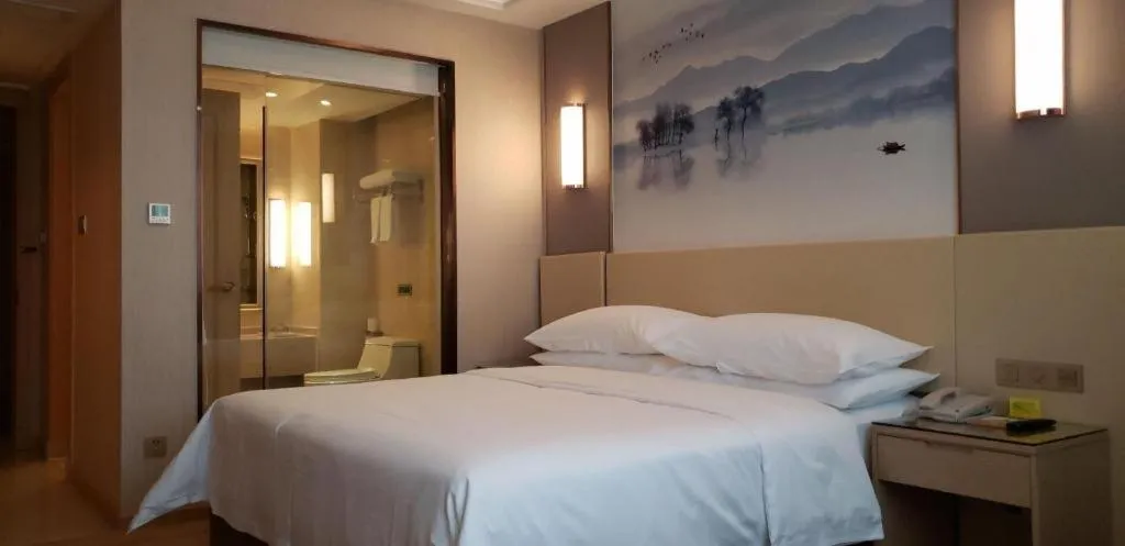 Bed in Vienna Hotel Hunan Huaihua Xupu Wanda Plaza