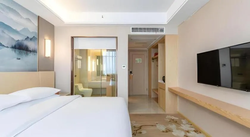 Bed in Vienna Hotel Hunan Huaihua Xupu Wanda Plaza
