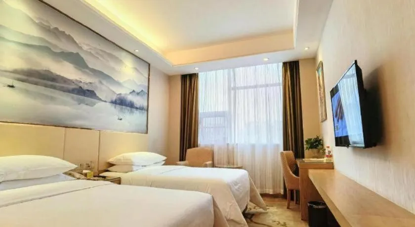 Bed in Vienna Hotel Hunan Huaihua Xupu Wanda Plaza