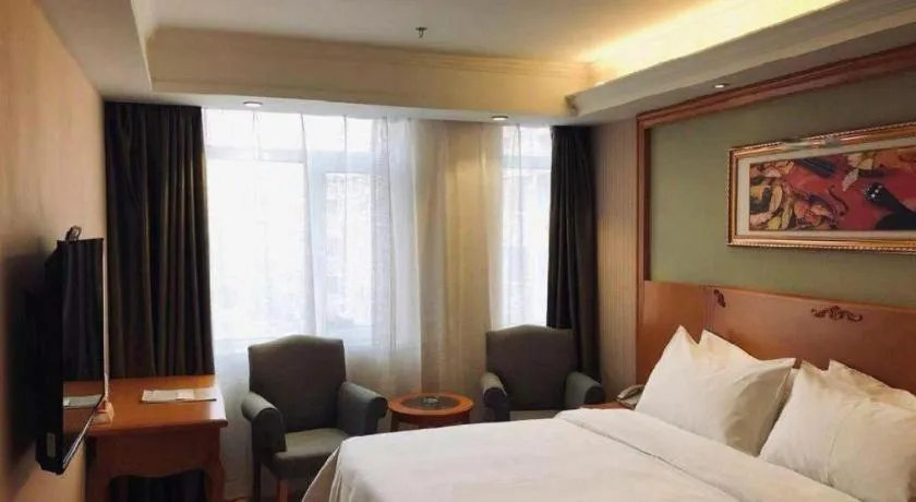 Bed in Vienna Hotel Inner Mongolia Tongliao Development Zone