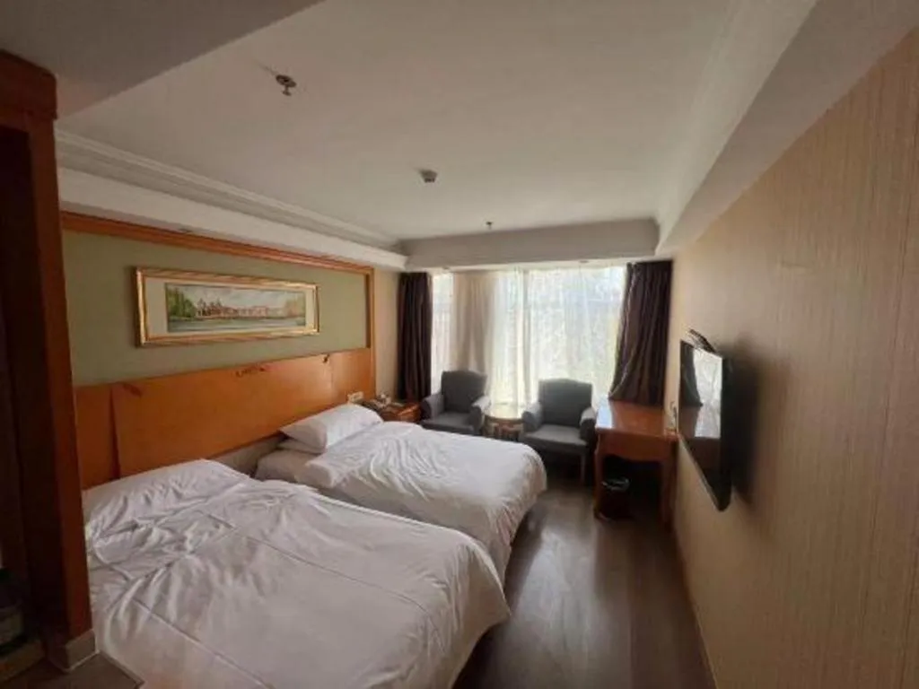 Bed in Vienna Hotel Inner Mongolia Tongliao Development Zone