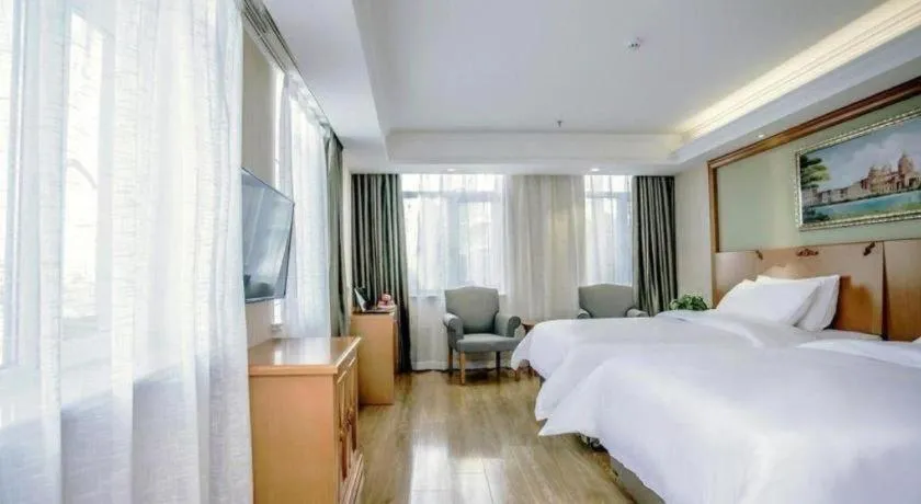 Bed in Vienna Hotel Inner Mongolia Tongliao Development Zone