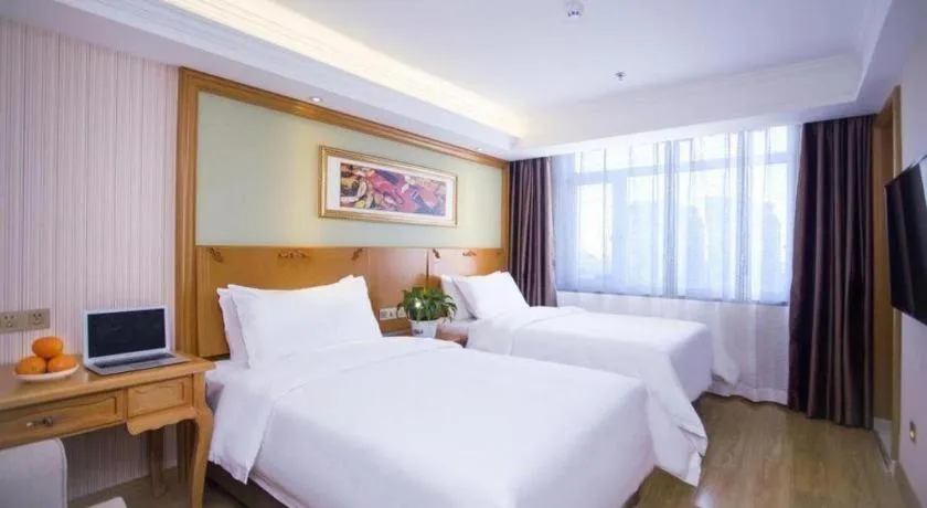 Bed in Vienna Hotel Inner Mongolia Tongliao Development Zone