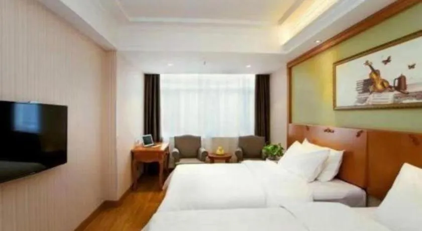 Bed in Vienna Hotel Inner Mongolia Tongliao Development Zone