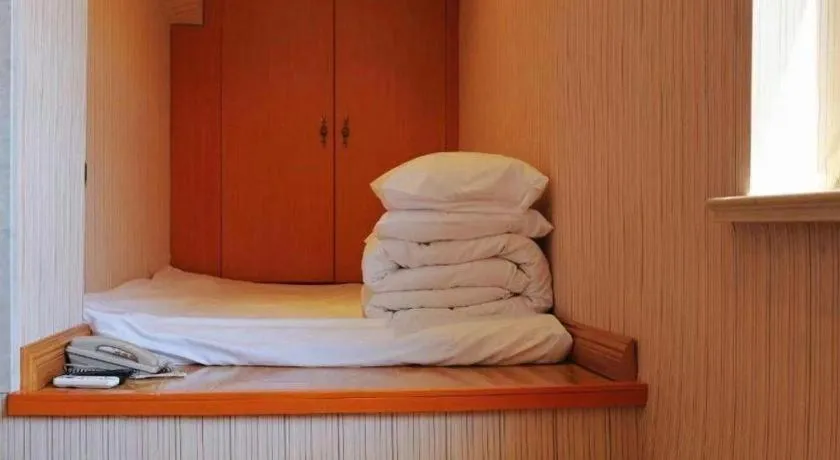 Bed in Vienna Hotel Inner Mongolia Tongliao Development Zone