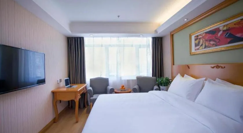 Bed in Vienna Hotel Inner Mongolia Tongliao Development Zone