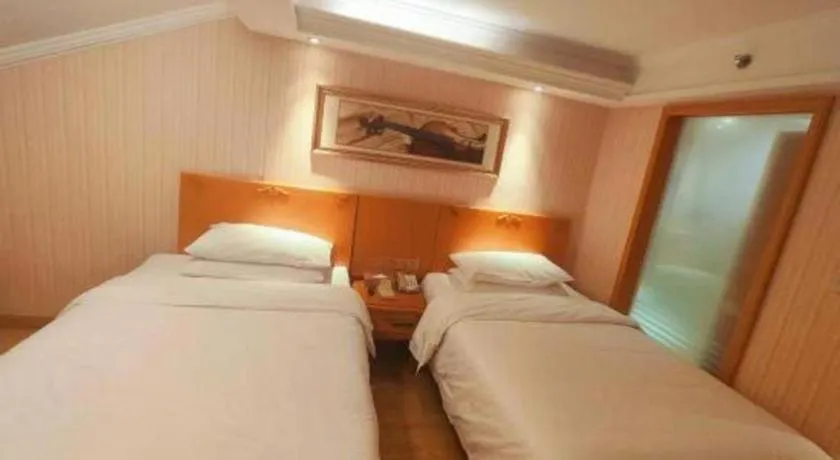 Bed in Vienna Hotel Inner Mongolia Tongliao Development Zone