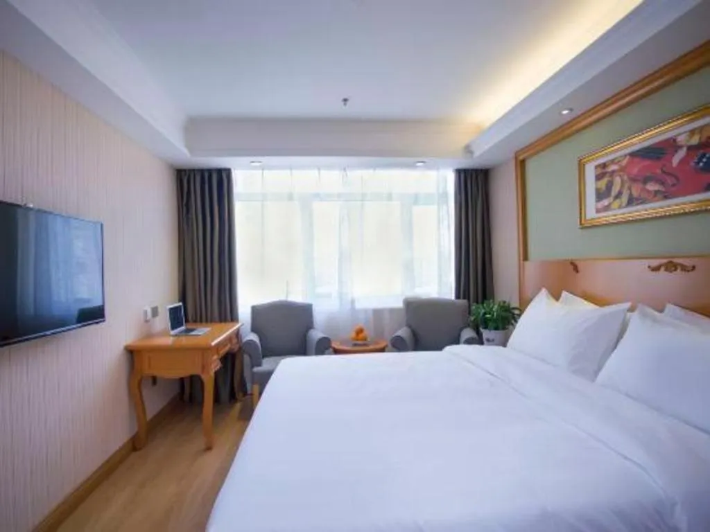 Bed in Vienna Hotel Inner Mongolia Tongliao Development Zone