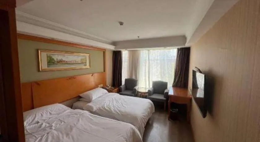 Bed in Vienna Hotel Inner Mongolia Tongliao Development Zone