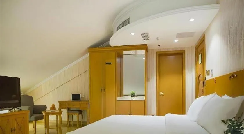 Bed in Vienna Hotel Inner Mongolia Tongliao Development Zone