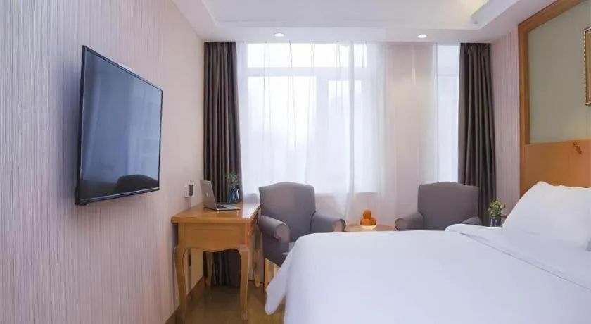 Bed in Vienna Hotel Inner Mongolia Tongliao Development Zone