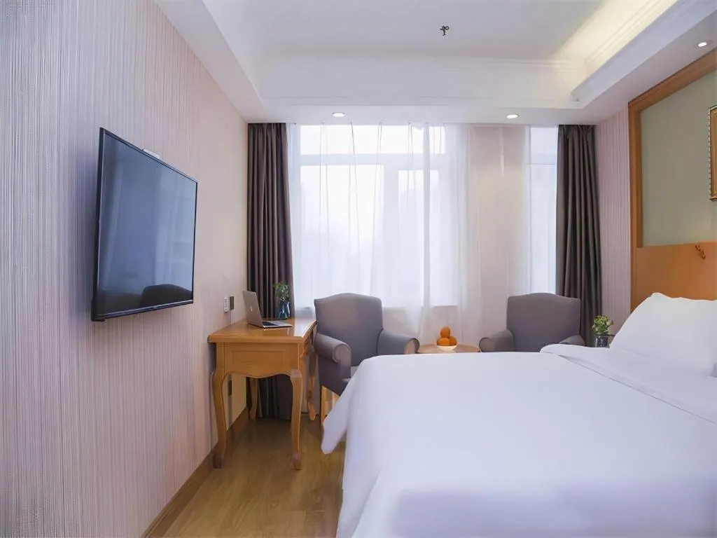 Bed in Vienna Hotel Inner Mongolia Tongliao Development Zone