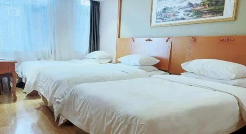 Bed in Vienna Hotel Inner Mongolia Tongliao Development Zone