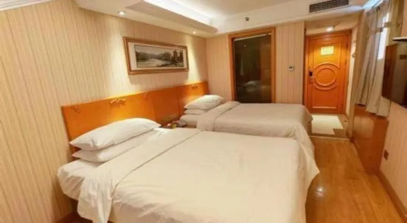 Bed in Vienna Hotel Inner Mongolia Tongliao Development Zone