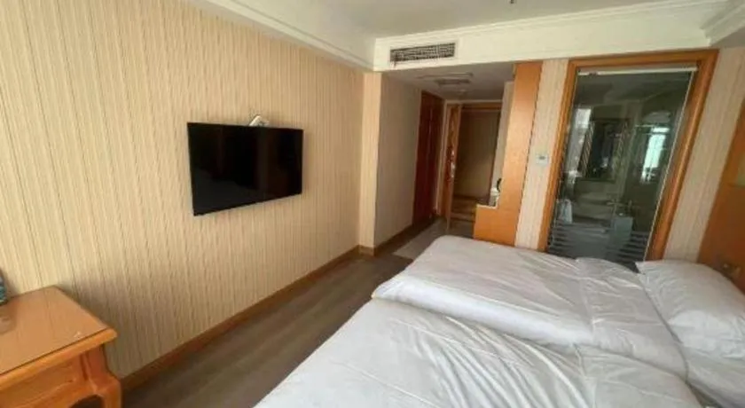 Bed in Vienna Hotel Inner Mongolia Tongliao Development Zone