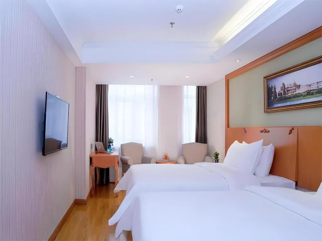 Bed in Vienna Hotel Inner Mongolia Tongliao Development Zone