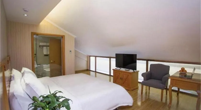 Bed in Vienna Hotel Inner Mongolia Tongliao Development Zone