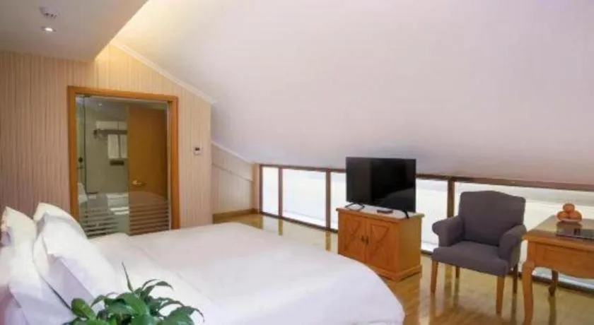 Bed in Vienna Hotel Inner Mongolia Tongliao Development Zone