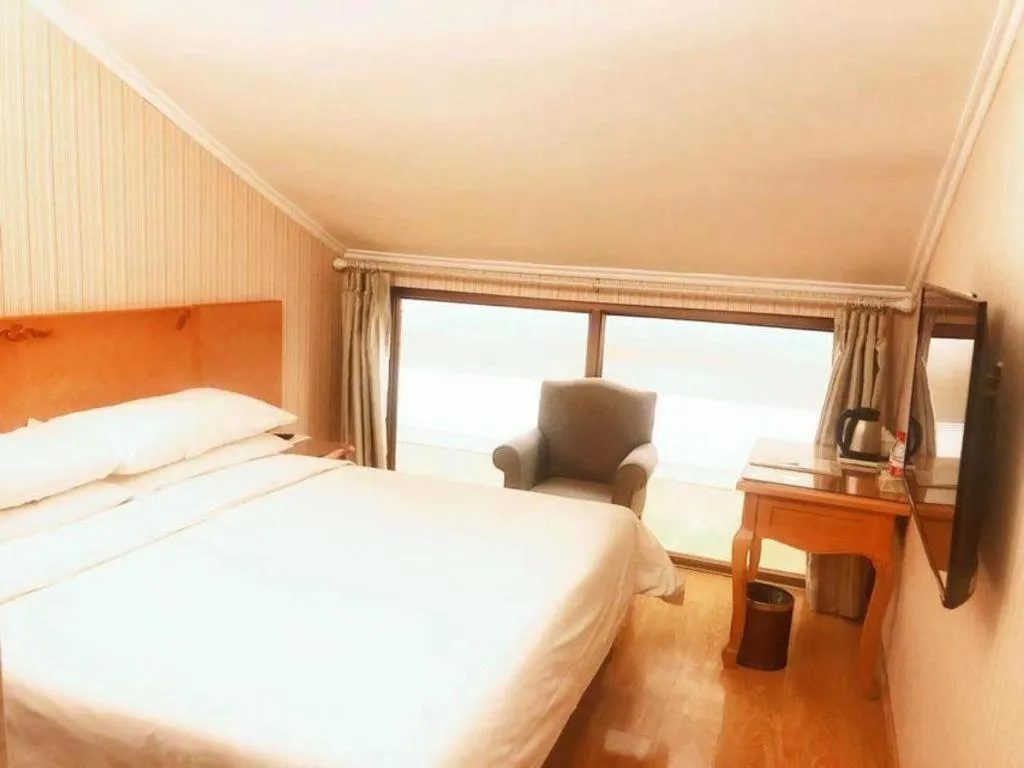 Bed in Vienna Hotel Inner Mongolia Tongliao Development Zone