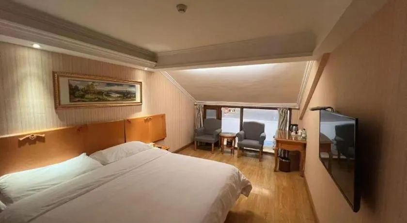 Bed in Vienna Hotel Inner Mongolia Tongliao Development Zone