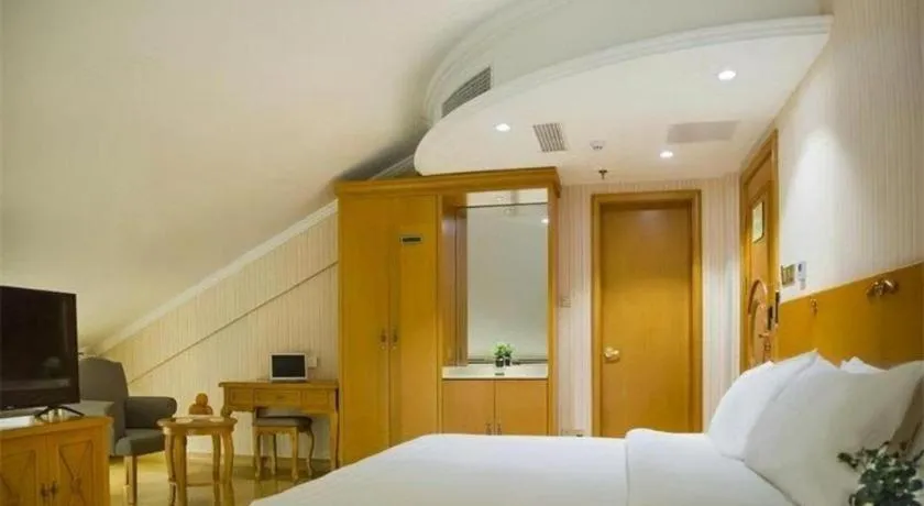 Bed in Vienna Hotel Inner Mongolia Tongliao Development Zone