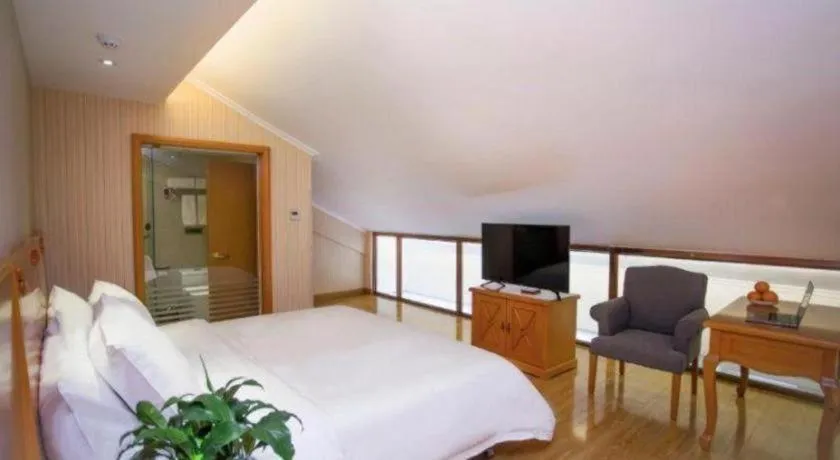 Bed in Vienna Hotel Inner Mongolia Tongliao Development Zone