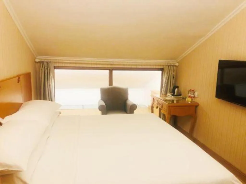 Bed in Vienna Hotel Inner Mongolia Tongliao Development Zone