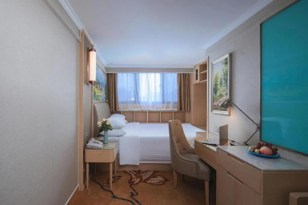 Bed in Vienna Hotel Shandong Liaocheng High-Tech Zong Yueji Park