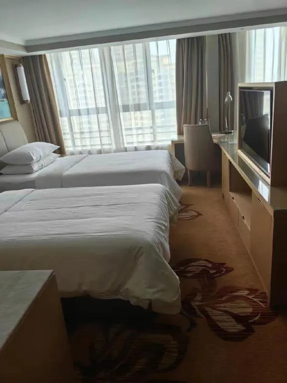 Bed in Vienna Hotel Shandong Liaocheng High-Tech Zong Yueji Park