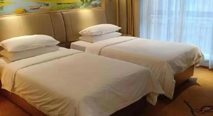 Bed in Vienna Hotel Shandong Liaocheng High-Tech Zong Yueji Park
