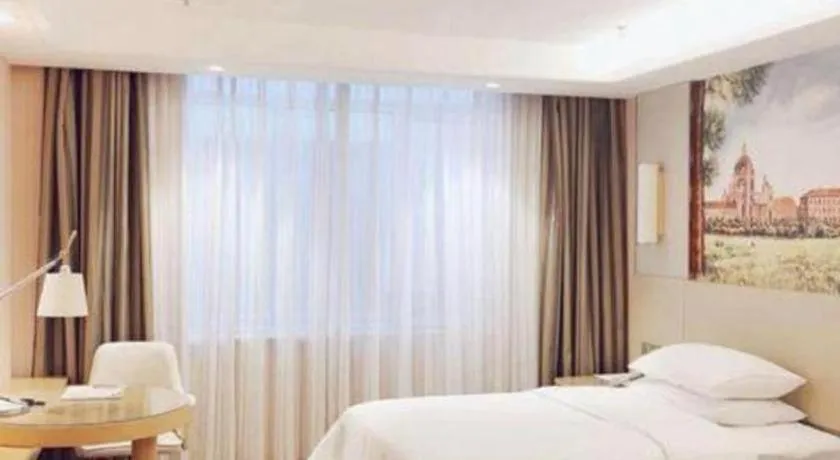 Bed in Vienna Hotel Shandong Qufu Sankong Landscape