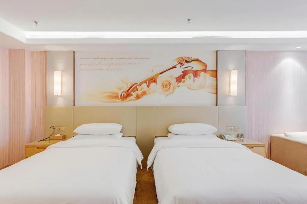 Bed in Vienna Hotel Shandong Qufu Sankong Landscape