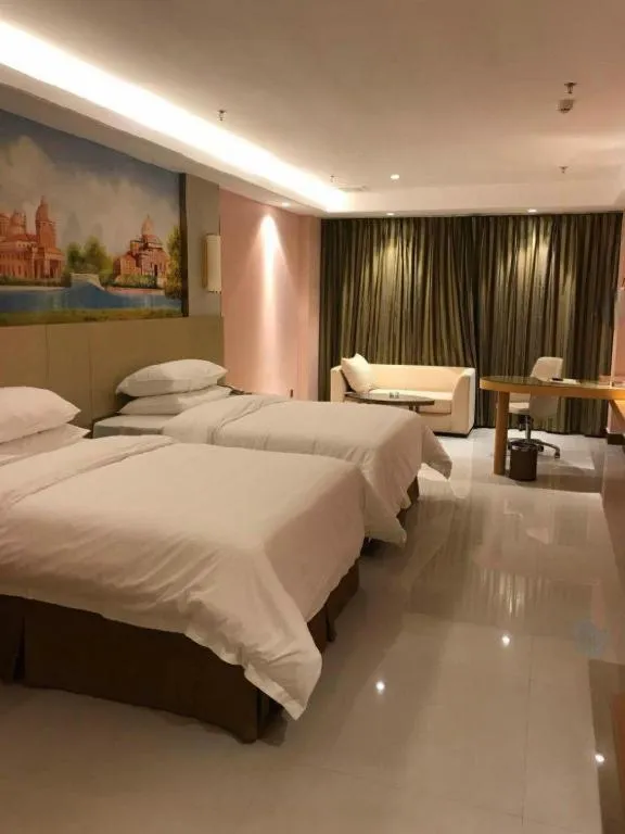 Bed in Vienna Hotel Shandong Qufu Sankong Landscape