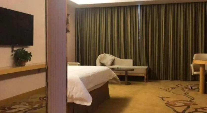 Bed in Vienna Hotel Shandong Qufu Sankong Landscape