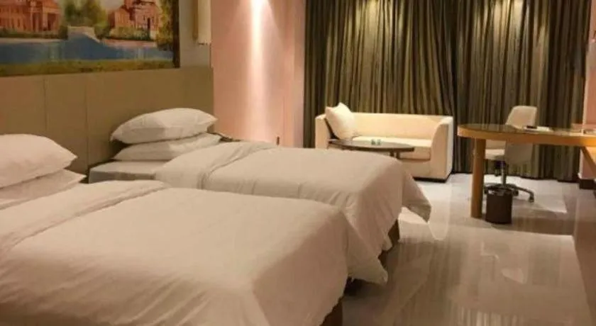 Bed in Vienna Hotel Shandong Qufu Sankong Landscape