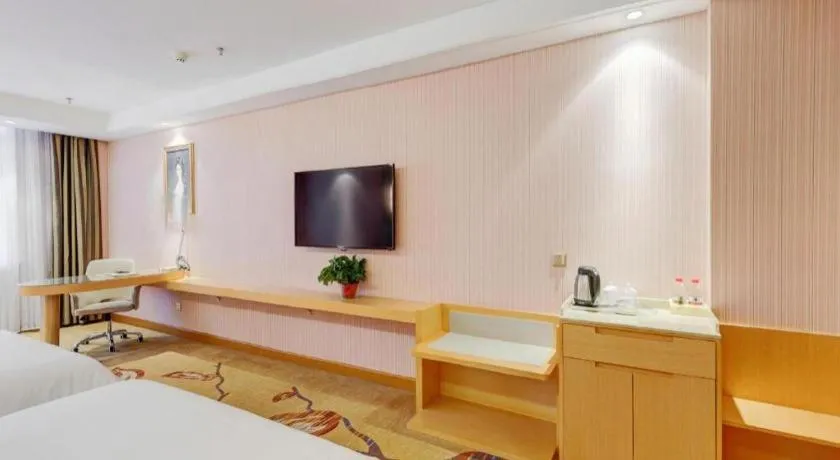 Bed in Vienna Hotel Shandong Qufu Sankong Landscape