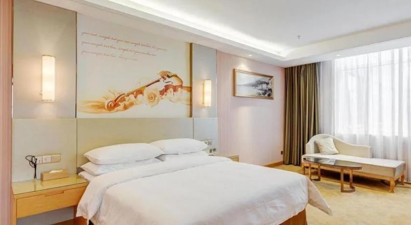 Bed in Vienna Hotel Shandong Qufu Sankong Landscape