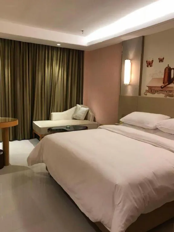 Bed in Vienna Hotel Shandong Qufu Sankong Landscape