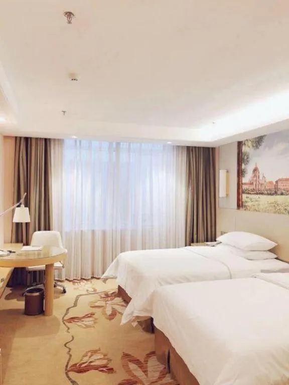 Bed in Vienna Hotel Shandong Qufu Sankong Landscape