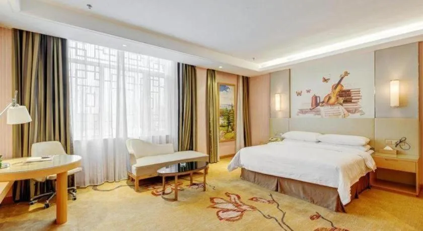 Bed in Vienna Hotel Shandong Qufu Sankong Landscape