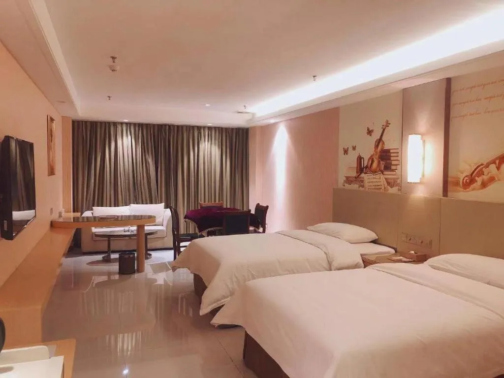 Bed in Vienna Hotel Shandong Qufu Sankong Landscape